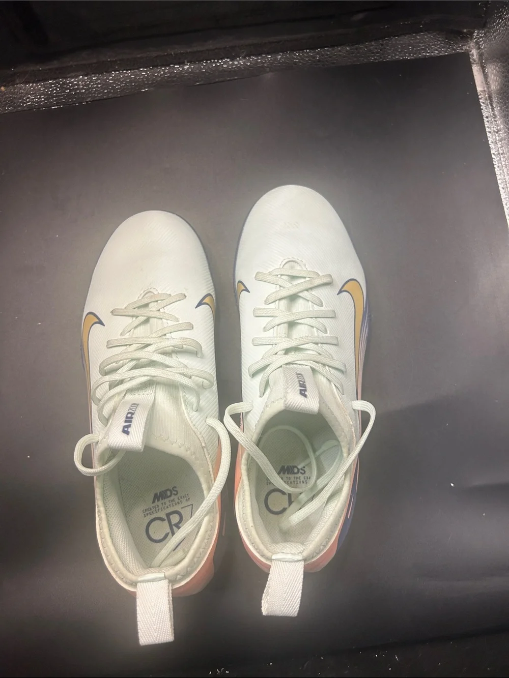 Nike Air Zoom Light Mint Soccer Shoes with Yellow Swoosh and Pastel Heel Accents